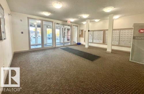 113 3315 James Mowatt Trail Sw, Edmonton, AB - Indoor Photo Showing Other Room