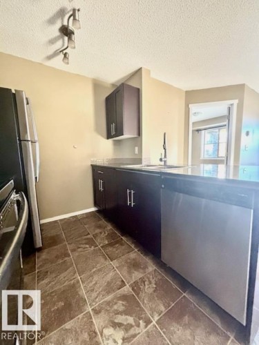 113 3315 James Mowatt Trail Sw, Edmonton, AB - Indoor Photo Showing Kitchen