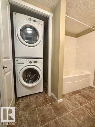 113 3315 James Mowatt Trail Sw, Edmonton, AB - Indoor Photo Showing Laundry Room
