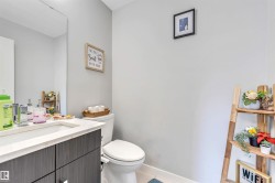 Bathroom with vanity and tile patterned floors - 