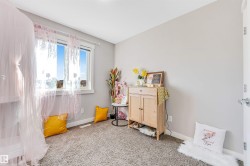 Recreation room with carpet and baseboards - 