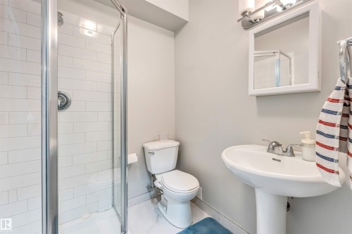 Full bathroom featuring a shower stall and toilet - 3478 Weidle Way, Edmonton, AB - Indoor Photo Showing Bathroom