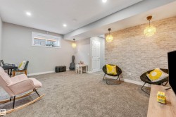 Sitting room with carpet floors and recessed lighting - 