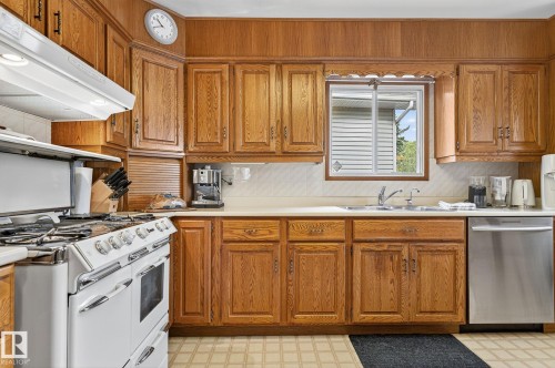 7708 98A Avenue Nw, Edmonton, AB - Indoor Photo Showing Kitchen With Double Sink