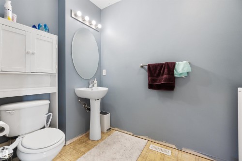 Half bath featuring toilet and baseboards - 36 2503 24 Street, Edmonton, AB - Indoor Photo Showing Bathroom