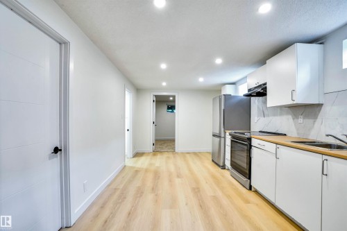 3806 85 Street, Edmonton, AB - Indoor Photo Showing Kitchen With Double Sink