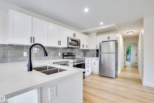 3806 85 Street, Edmonton, AB - Indoor Photo Showing Kitchen With Double Sink With Upgraded Kitchen