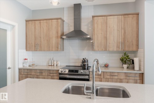 22143 80 Avenue, Edmonton, AB - Indoor Photo Showing Kitchen With Double Sink With Upgraded Kitchen