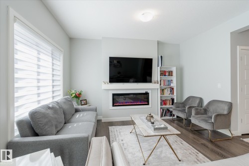 22143 80 Avenue, Edmonton, AB - Indoor Photo Showing Living Room With Fireplace