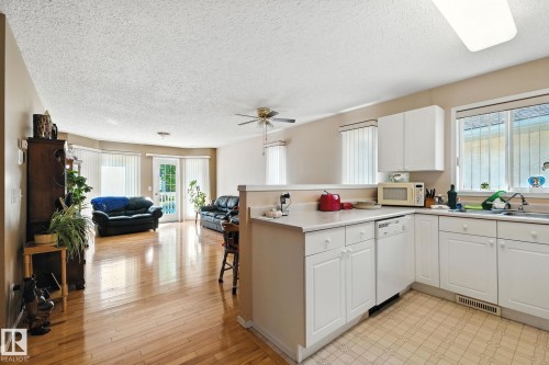 2 14428 Miller Blvd, Edmonton, AB - Indoor Photo Showing Kitchen With Double Sink