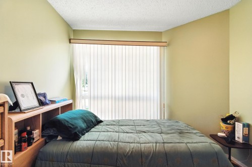 2 14428 Miller Blvd, Edmonton, AB - Indoor Photo Showing Bedroom