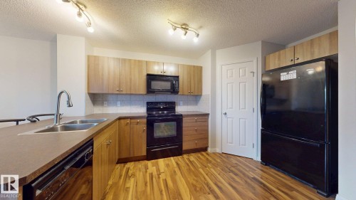 1030 177A Street, Edmonton, AB - Indoor Photo Showing Kitchen With Double Sink