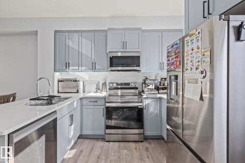 68 655 Watt Boulevard, Edmonton, AB - Indoor Photo Showing Kitchen With Stainless Steel Kitchen With Upgraded Kitchen