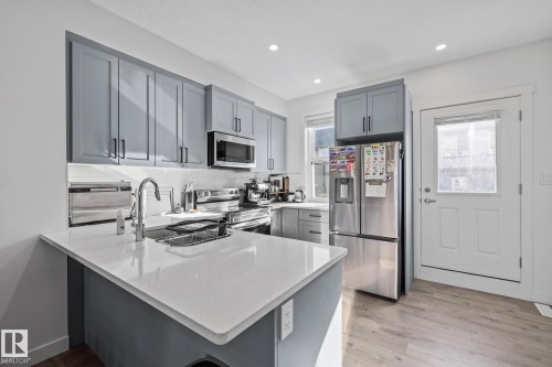 68 655 Watt Boulevard, Edmonton, AB - Indoor Photo Showing Kitchen With Stainless Steel Kitchen With Double Sink With Upgraded Kitchen