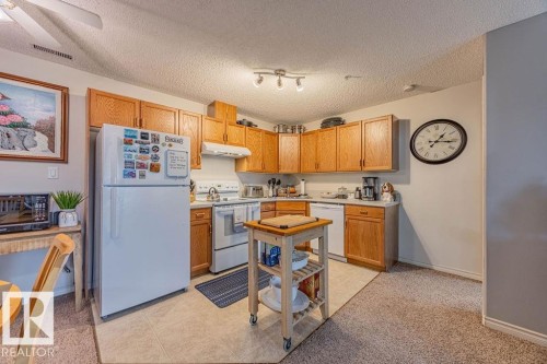 314 16303 95 Street, Edmonton, AB - Indoor Photo Showing Kitchen With Double Sink