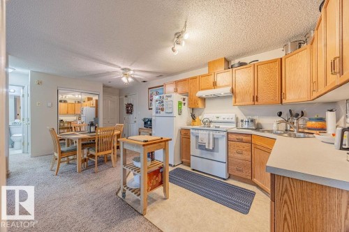 314 16303 95 Street, Edmonton, AB - Indoor Photo Showing Kitchen With Double Sink