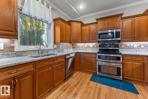 1512 Horseshoe Bay Estates, Cold Lake, AB - Indoor Photo Showing Kitchen With Double Sink