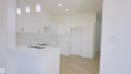 11 2710 66 Street, Edmonton, AB - Indoor Photo Showing Kitchen With Double Sink