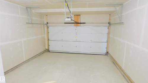 11 2710 66 Street, Edmonton, AB - Indoor Photo Showing Garage
