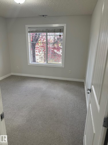 115 2098 Blackmud Creek Drive Sw, Edmonton, AB - Indoor Photo Showing Other Room