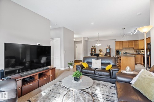 213 1406 Hodgson Way, Edmonton, AB - Indoor Photo Showing Living Room