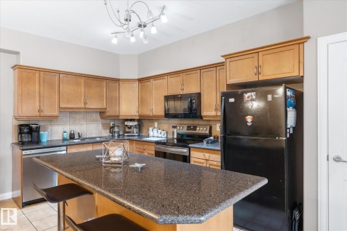 213 1406 Hodgson Way, Edmonton, AB - Indoor Photo Showing Kitchen