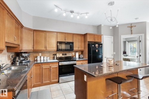 213 1406 Hodgson Way, Edmonton, AB - Indoor Photo Showing Kitchen With Double Sink
