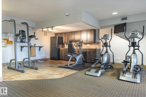 213 1406 Hodgson Way, Edmonton, AB - Indoor Photo Showing Gym Room