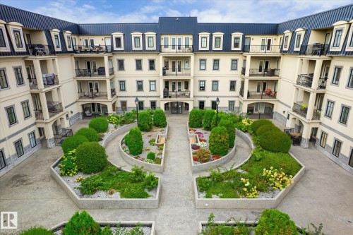 213 1406 Hodgson Way, Edmonton, AB - Outdoor With Balcony With Facade