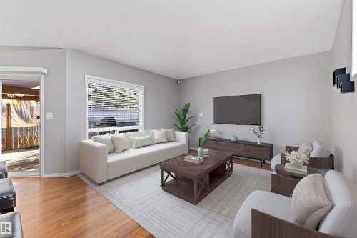 123 215 Blackburn Drive, Edmonton, AB - Indoor Photo Showing Living Room