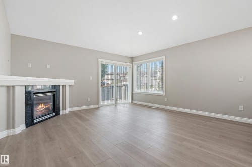 15216 49 Street, Edmonton, AB - Indoor Photo Showing Living Room With Fireplace
