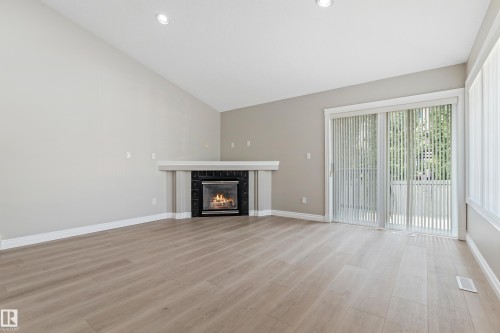15216 49 Street, Edmonton, AB - Indoor Photo Showing Living Room With Fireplace
