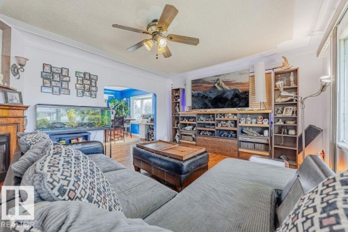 12339 89 Street Nw, Edmonton, AB - Indoor Photo Showing Living Room With Fireplace