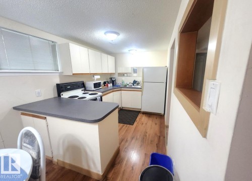 12339 89 Street Nw, Edmonton, AB - Indoor Photo Showing Kitchen With Double Sink