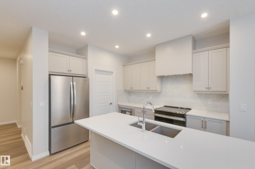 102 Sunland Way, Sherwood Park, AB - Indoor Photo Showing Kitchen With Stainless Steel Kitchen With Double Sink With Upgraded Kitchen