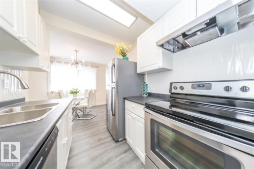 692 Abbottsfield Road, Edmonton, AB - Indoor Photo Showing Kitchen With Stainless Steel Kitchen With Double Sink