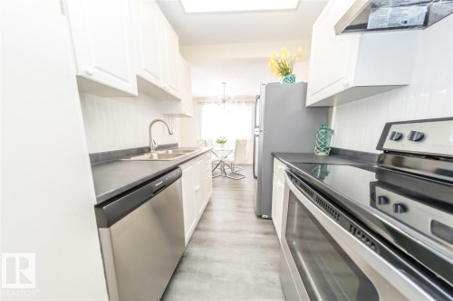 692 Abbottsfield Road, Edmonton, AB - Indoor Photo Showing Kitchen With Stainless Steel Kitchen With Double Sink