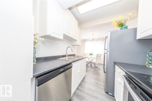 692 Abbottsfield Road, Edmonton, AB - Indoor Photo Showing Kitchen With Stainless Steel Kitchen With Double Sink