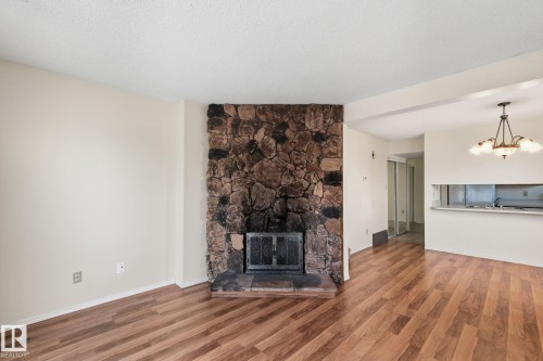 181 Lancaster Terrace, Edmonton, AB - Indoor Photo Showing Living Room With Fireplace