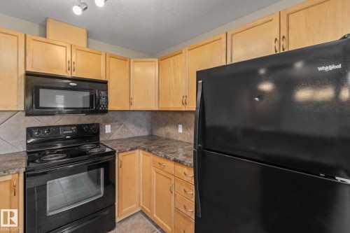 313 11615 Ellerslie Road, Edmonton, AB - Indoor Photo Showing Kitchen