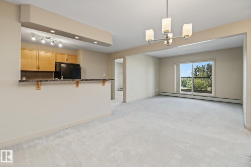 313 11615 Ellerslie Road, Edmonton, AB - Indoor Photo Showing Kitchen