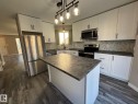 46 Matthew Road, Spruce Grove, AB  - Indoor Photo Showing Kitchen With Stainless Steel Kitchen With Double Sink With Upgraded Kitchen 
