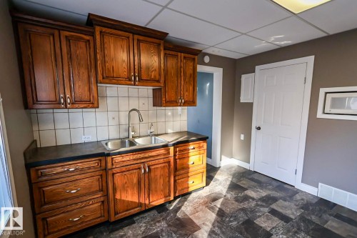5016 48 Street, Myrnam, AB - Indoor Photo Showing Kitchen With Double Sink