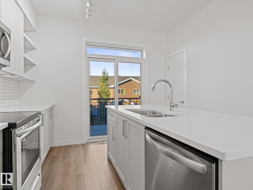 35 100 Jensen Lakes Boulevard, St. Albert, AB - Indoor Photo Showing Kitchen With Double Sink