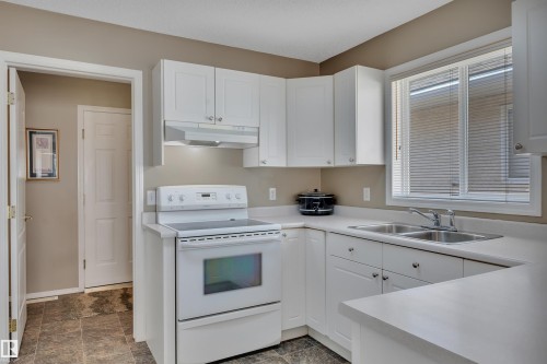 43 14428 Miller Boulevard, Edmonton, AB - Indoor Photo Showing Kitchen With Double Sink