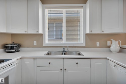 43 14428 Miller Boulevard, Edmonton, AB - Indoor Photo Showing Kitchen With Double Sink