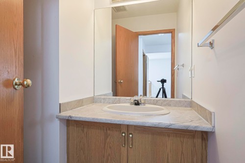 Bathroom with vanity & toilet - 4631 43 Avenue, Edmonton, AB - Indoor Photo Showing Bathroom