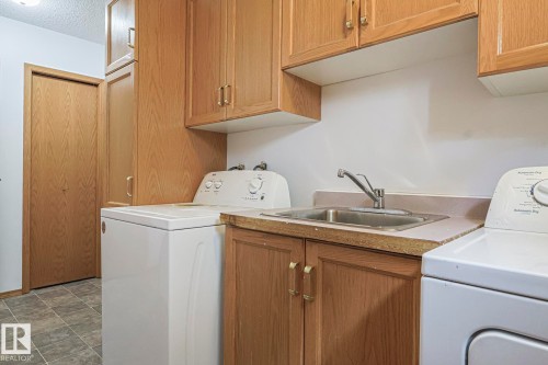 Main Floor laundry - 4631 43 Avenue, Edmonton, AB - Indoor Photo Showing Laundry Room