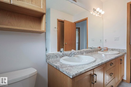 Full bathroom featuring double vanity - 4631 43 Avenue, Edmonton, AB - Indoor Photo Showing Bathroom