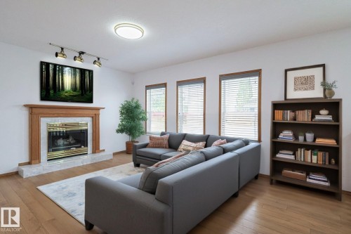 4631 43 Avenue, Edmonton, AB - Indoor Photo Showing Living Room With Fireplace